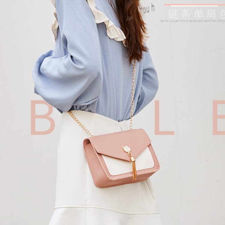 1757bdf6-39c3-4a4b-ba0e-2631910e41ab.jpg cat messenger bag