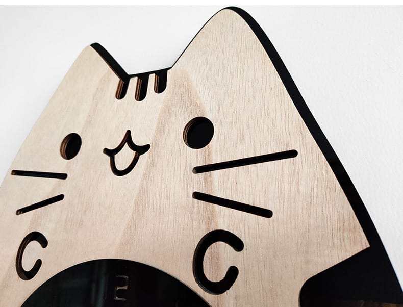 cat clock with wagging tail