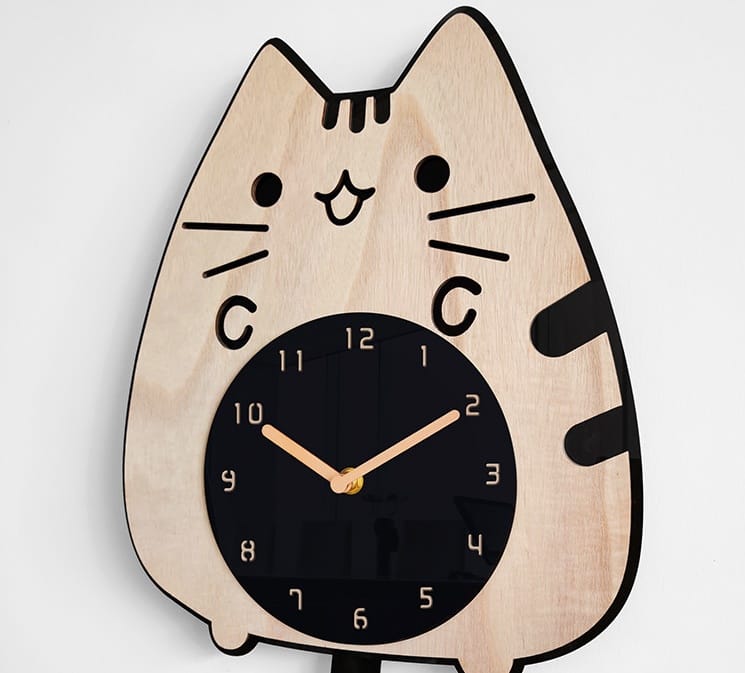 cat clock with wagging tail