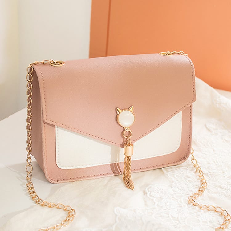 b652662a-de7d-45af-a1b9-24e24ccced5f.jpg cat messenger bag