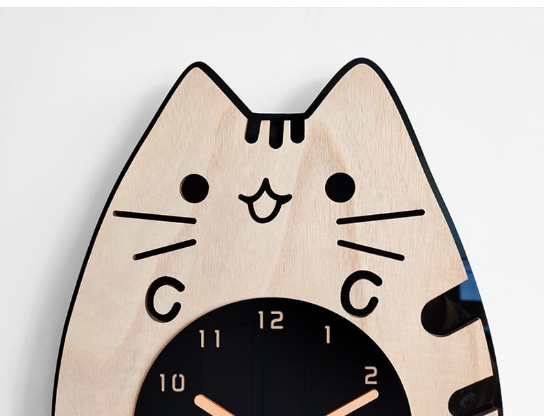cat clock with wagging tail